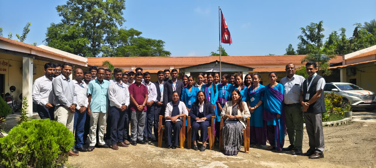 Officials and participants at the induction training